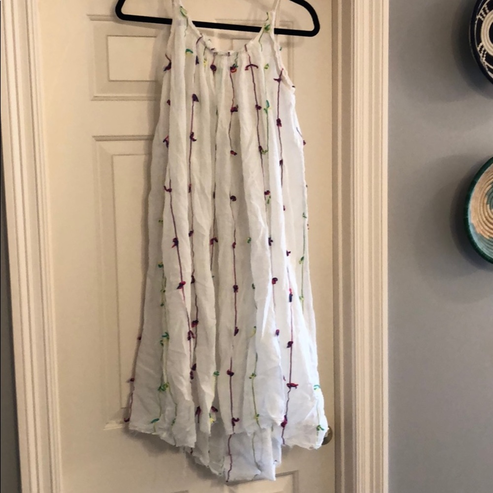 White shear dress with yarn fringe details
